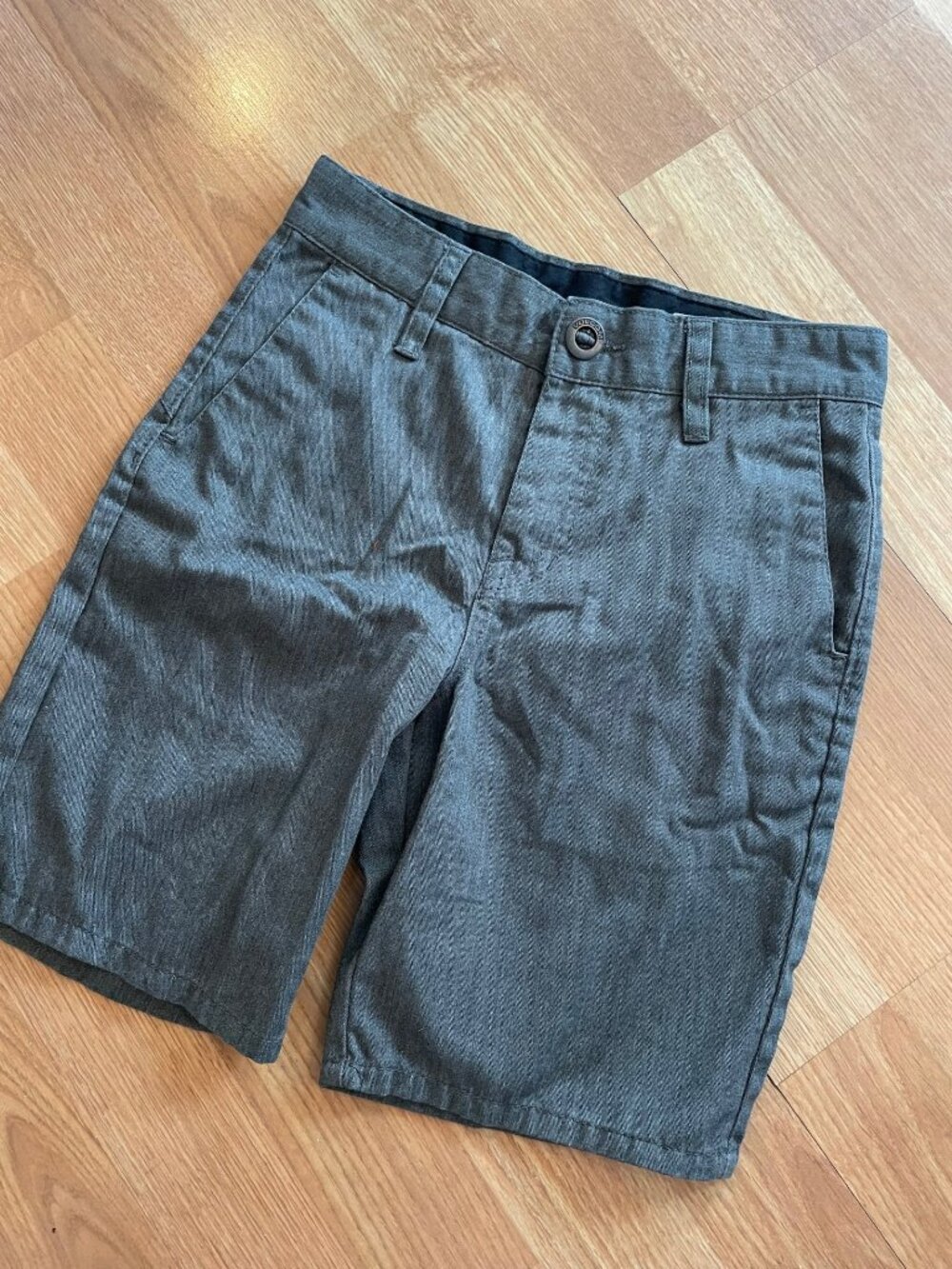 Kids/Boys Volcom grey shorts size 24 pockets front and back. No signs of wear.